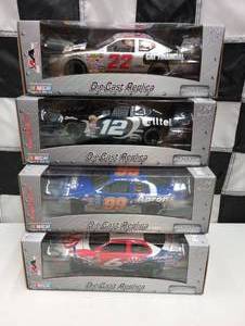 lot 980 image: Team Caliber Pit Stop 124th Scale Die Cast Cars