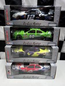lot 981 image: Team Caliber Pit Stop 124th Scale Die Cast Cars