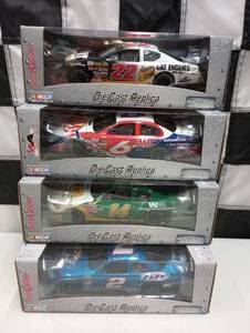 lot 982 image: Team Caliber Pit Stop 124th Scale Die Cast Cars
