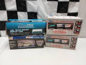 lot 1015 image: Clear Display Cases With Garage Backgrounds For 124th Scale Cars