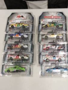 lot 983 image: Team Caliber Pit Stop 164th Scale Die Cast Cars
