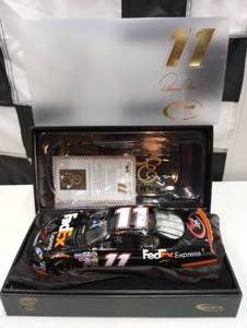 lot 1019 image: Owners Elite Denny Hamlin #11 Fed Ex 124th Scale Die Cast Car