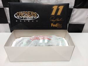 lot 1032 image: Owners Club Select Denny Hamlin #11 FedEx Ground124th Scale Die Cast Car