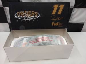 lot 1033 image: Owners Club Select Denny Hamlin #11 FedEx Express124th Scale Die Cast Car