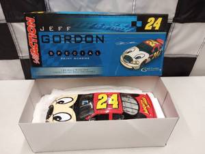 lot 1034 image: Action Special Paint Scheme Jeff Gordon #24 DuPont  Foose Custom 124th Scale Die Cast Car