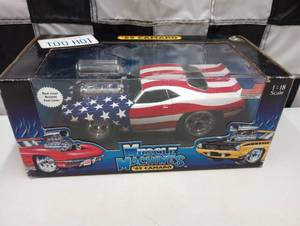 lot 1065 image: Muscle Machines 1969 Camaro 118th Scale Die Cast Car