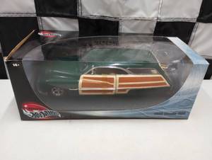 lot 1069 image: New in box Hot Wheels 1950 Merc Woodie 118th Scale Die Cast Car