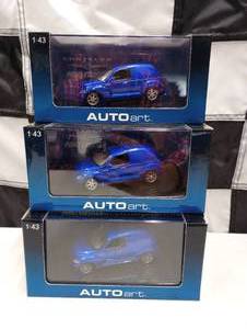 lot 1074 image: Autoart  Chrysler Panel Cruiser 143rd Scale Die Cast Car