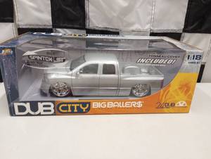 lot 1087 image: Dub City Big Ballers Dodge Ram 118th Scale Die Cast Truck