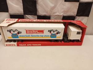 lot 1101 image: Vintage Ertl Pressed Steel Semi Americas Favorite Toy Store