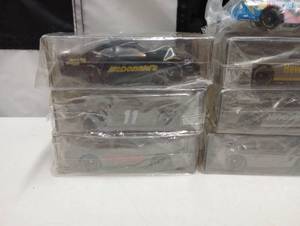 lot 1124 image: (9) Assorted Racing Champions Premire Limited Edition 164th Die Cast Cars