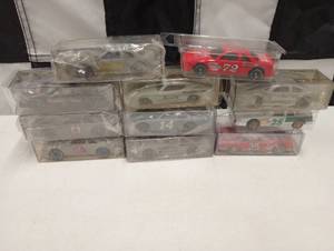 lot 1125 image: (9) Assorted Racing Champions Premire Limited Edition 164th Die Cast Cars