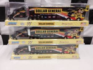 lot 1128 image: (3) Dollar General Transporters.