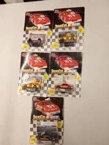 lot 616 image: Racing Champions 164th Scale Die Cast Cars.