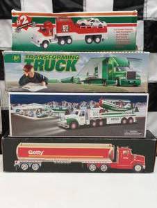 lot 1135 image: (4) Assorted Transporters & Haulers 711, BP Hess & Getty