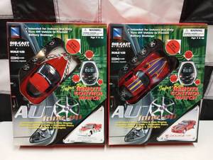 lot 1141 image: (2) New Auto Tune Up Die Cast Remote Controlled Cars