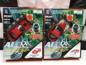 lot 1142 image: (2) New Auto Tune Up Die Cast Remote Controlled Cars