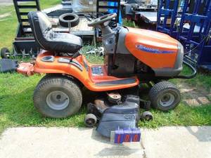 Husquvarna 1848 Riding mower with Kawasaki engine. Used condition. Runs well. As shown. THIS ITEM HAS A RESERVE.