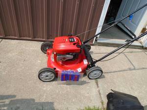 Troy Bilt push mower. Looks nearly new. Tested & works. As shown.