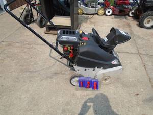 MTD snow thrower. Good overall condition. Tested & works. Does need oil cap. As shown.