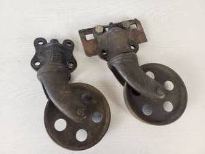 Pair of Antique NUTTING Cart Cast Iron Caster Wheels