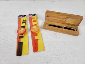 (2) The Simpsons Digital Watches and Looney Tunes Road Runner Pen in Wood Box