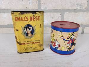 lot 376 image: Dills Best Tobacco Tin and Ohio Art Coin Bank