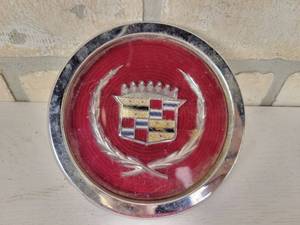 lot 379 image: Metal & Plastic Cadillac Wheel Center Cap