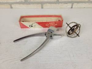 lot 384 image: TEXAN Nut Sheller and Metal Gyroscope