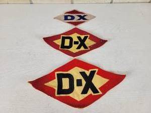 lot 402 image: (3) Vintage D-X Patches