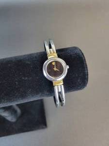 lot 482 image: Movado Womens Two-Toned Bangle Watch with Sapphire Crystal