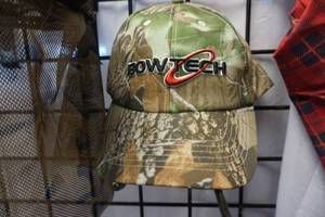 lot 141 image: Bowtech Baseball Cap With Camo Cap With Camo FaceBug Shield
