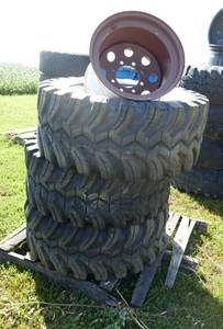 lot 21 image: 3 Ground Hawg 1740-16.5 tires with rims