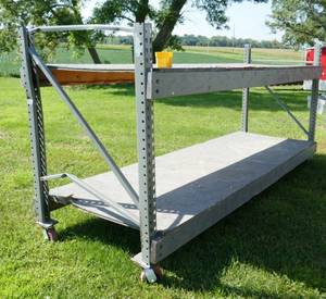 lot 29 image: Storage rack on wheels 45 inches wide x 12 ft long