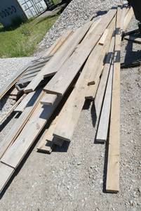 lot 59 image: Pile of new lumber tongue in groove boards