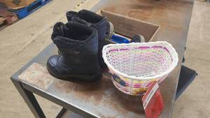 lot 53 image: Childrens snow boots and bike parts