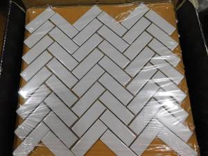 lot 42 image: MSI Retro Gray Herringbone Glossy Porcelain Floor and Wall Tile