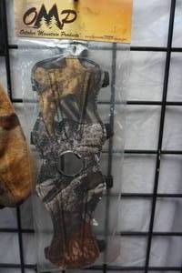 lot 140 image: October Mountain Products Archers Arm Guard With Tarantula Camo Water Bottle Holder