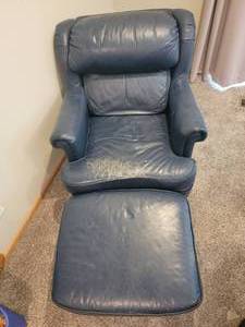 lot 24 image: Studded Blue Leather Arm Chair