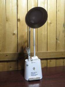 lot 39 image: OttLite 21 LED Rechargable Desk Lamp With Phone Holder
