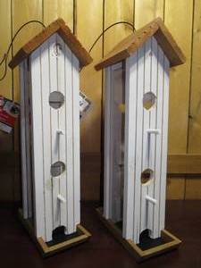 lot 44 image: 2 Quality Meijer Tower Wood Seed Feeders