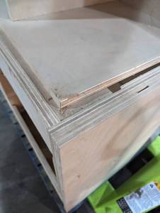 Pallet of unfinished cabinets and cubes