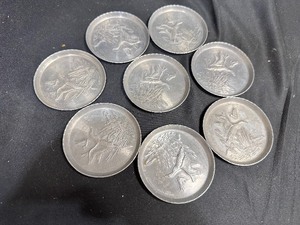 lot 169 image: Set of 10 Vintage Aluminum Stamped Coasters with Flying Duck Motif