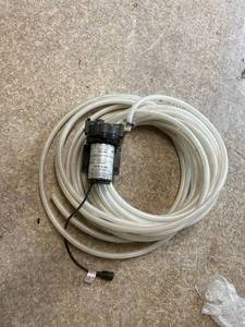 lot 59 image: Delivery Pump & Hose