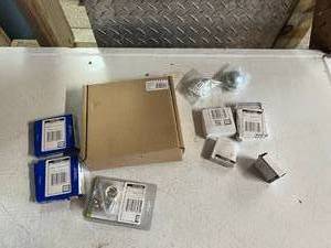 lot 78 image: NIB Helix Mustang 2 Caliper Bracket Set & Other New Parts