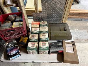lot 107 image: Table of Vintage Auto Parts