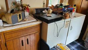 lot 44 image: Content atop and under mudroom sink as well as atop the washer and dryer