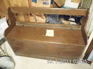lot 12 image: bench with storage under the seat.