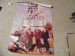 lot 21 image: Vintage poster of The Rat Pack featuring Frank Sinatra, Dean Martin, Sammy Davis Jr and the rest of the gang