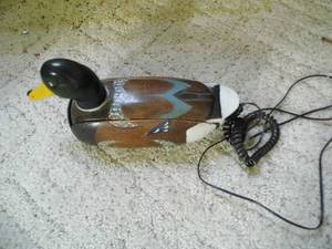 lot 55 image: Duck shaped telephone